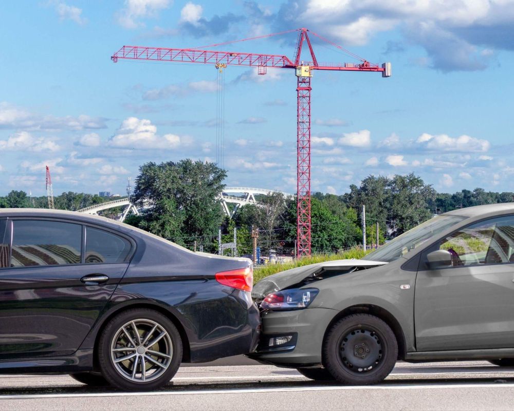 a couple of cars that are next to each other