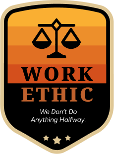 A badge featuring balanced scales above the text "WORK ETHIC" with a gradient orange background. Below, it says, "We Don’t Do Anything Halfway." Three stars are at the bottom.