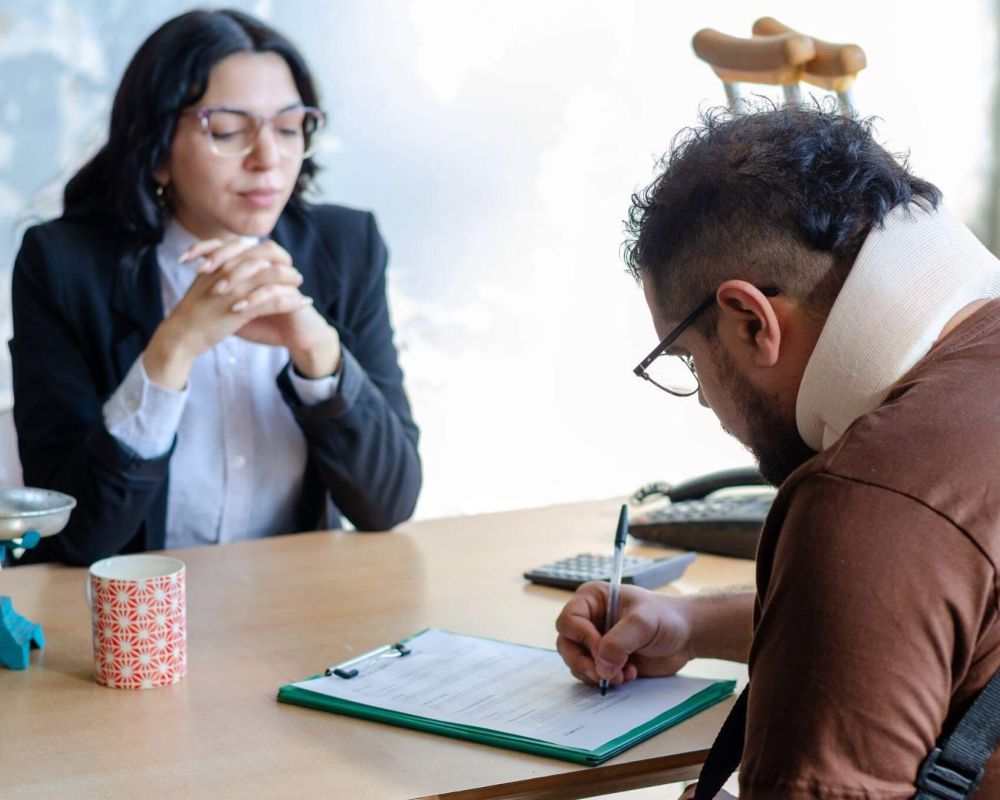 a man and a woman sitting at a table